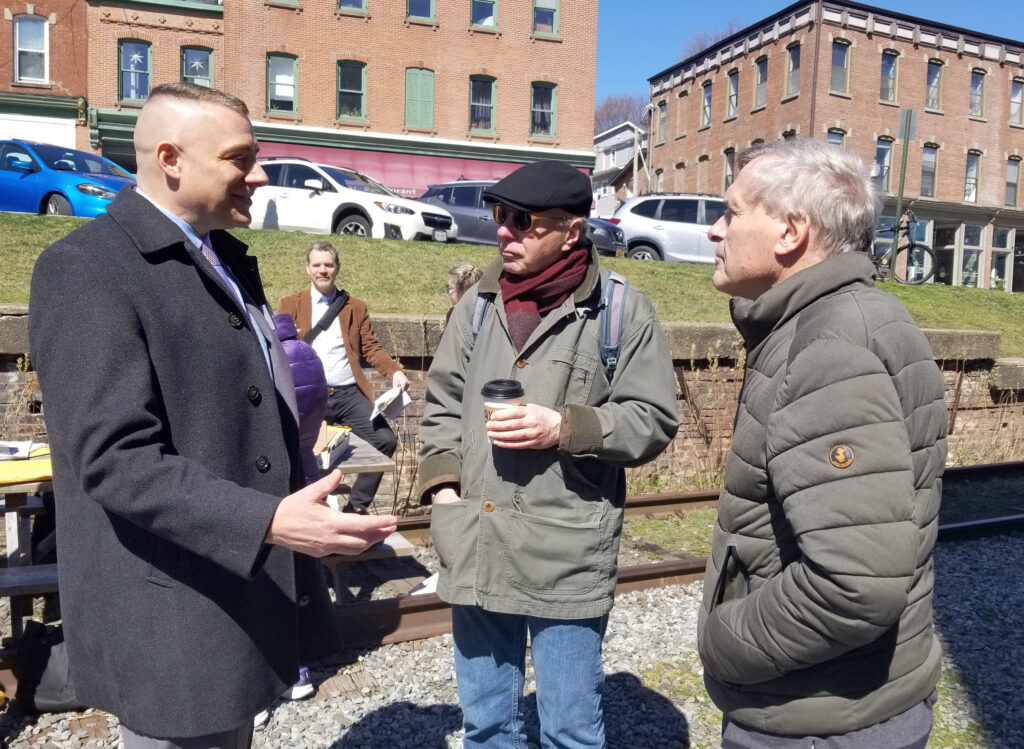 Anthony Parisi speaking with locals in Beacon.